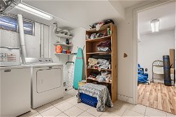 25 Lower Level Laundry Room.jpg